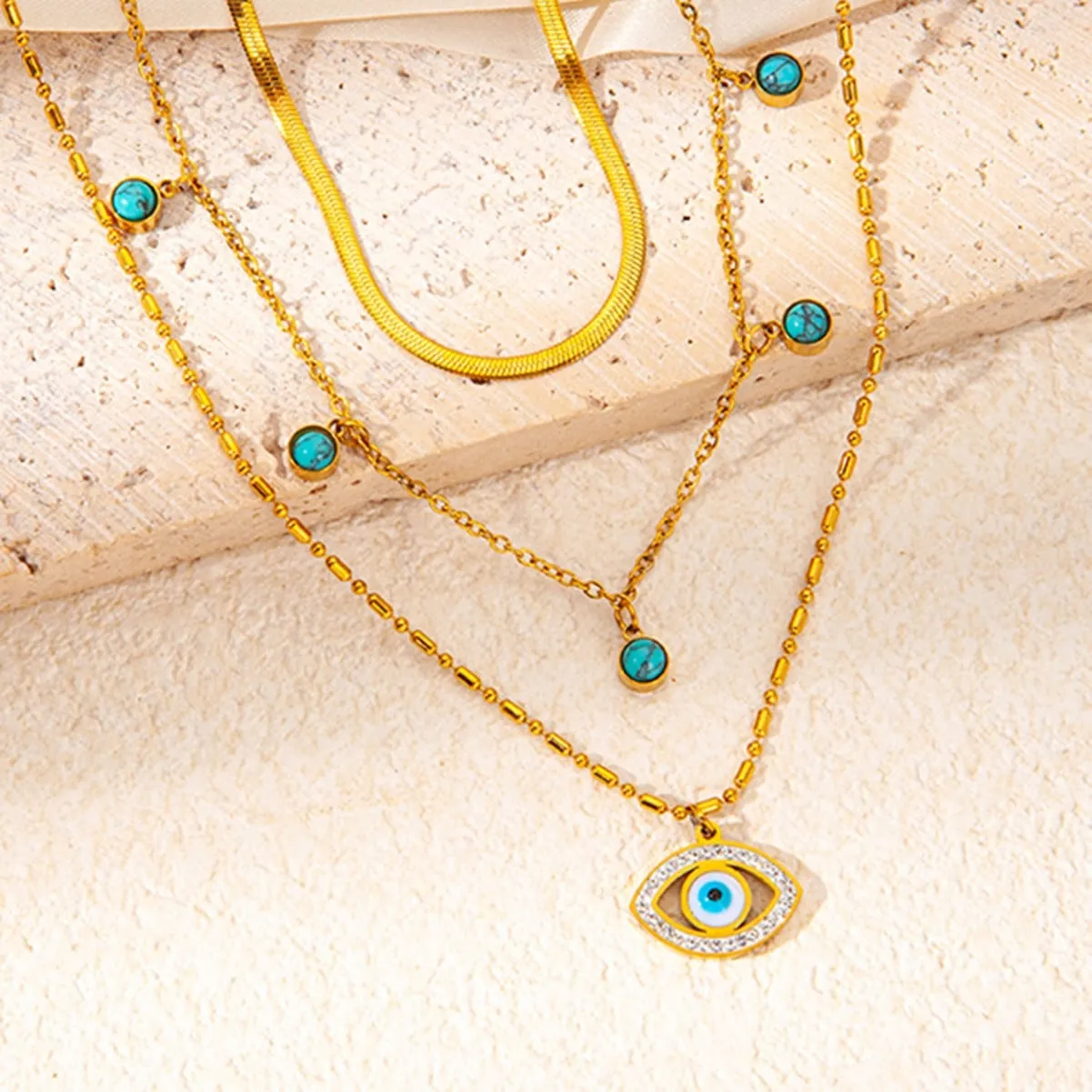 18K gold multi-layer chain with devil's eye diamond design trendy and unique necklace